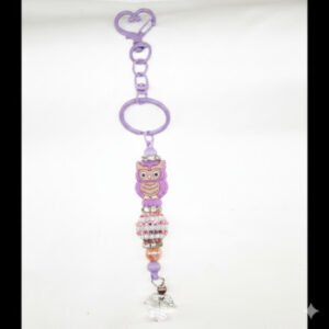 stunning owl with crystals and an angel the bottom